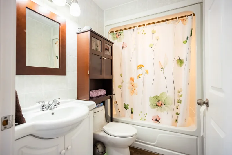 Bathroom with vanity and bath