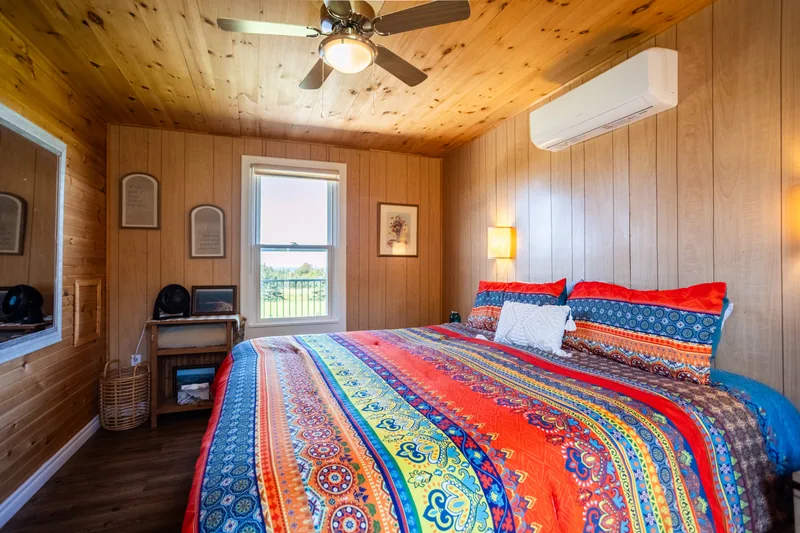Bedroom with colourful bedding