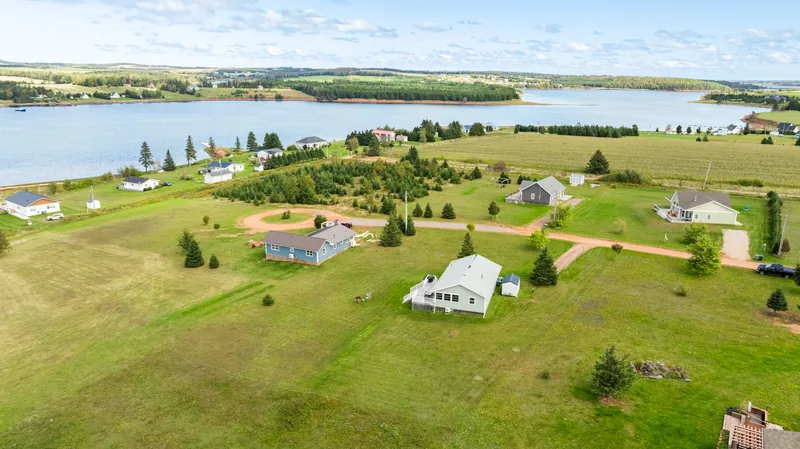 Aerial view of the cottage with the river beyond