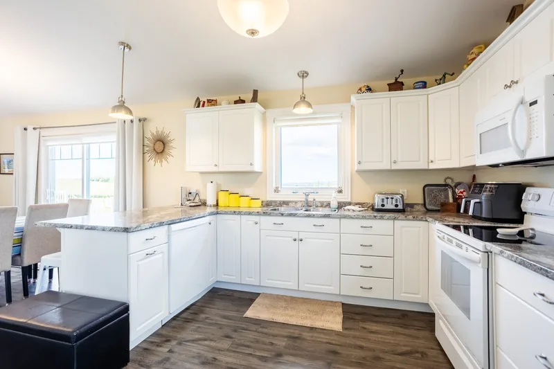 Kitchen with white cabinets