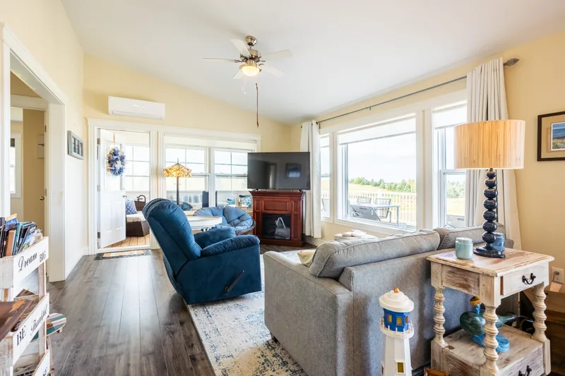 Living room with blue seating