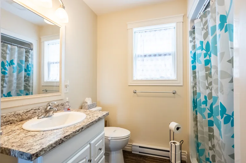 Bathroom with bath and vanity