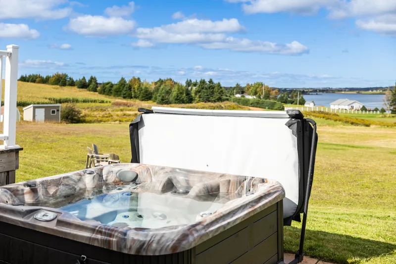 Hot tub with waterfront view