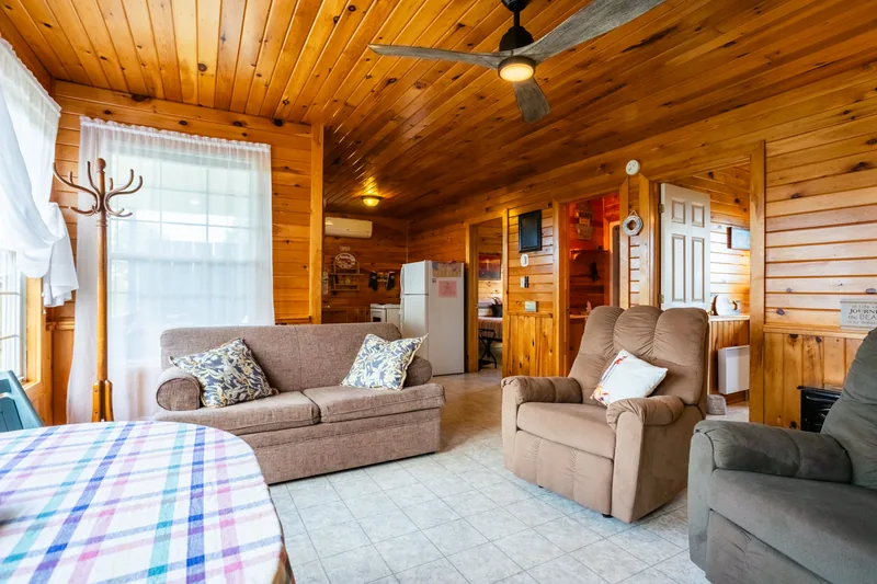 Living area with sofa and armchairs