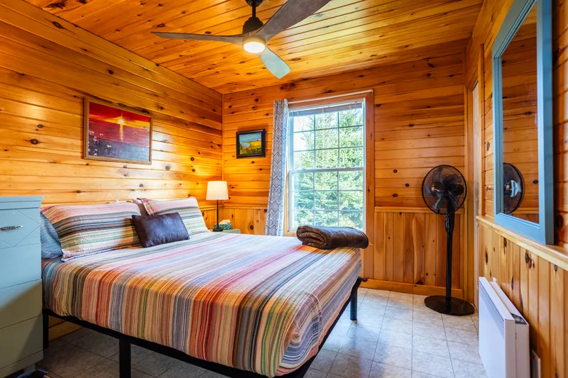 Bedroom with striped bedding