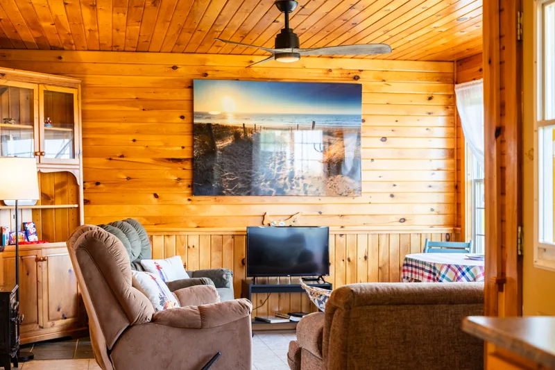 Living room with coastal artwork