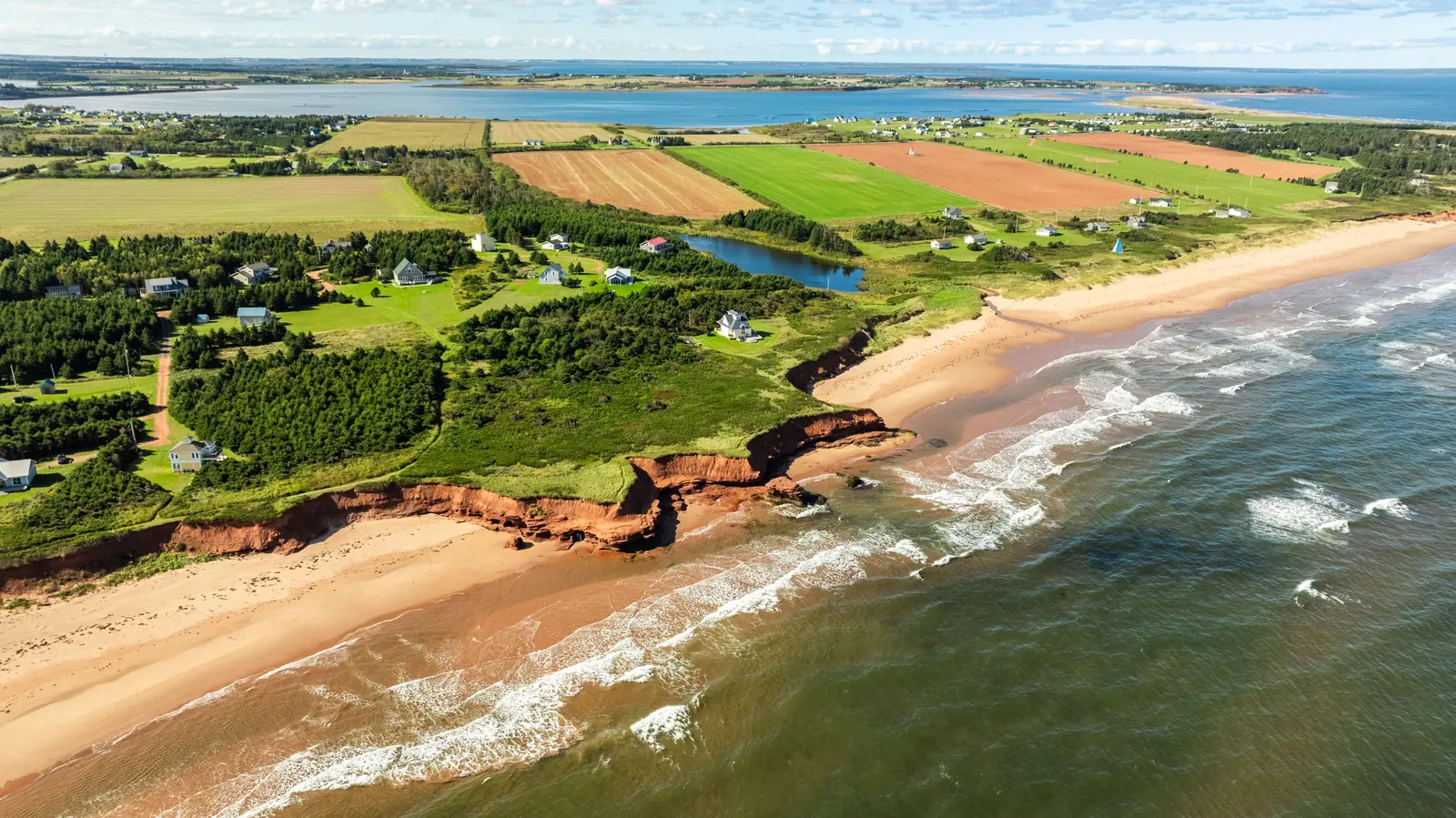 Nearby beach and red cliffs aerial, separate from the cottage