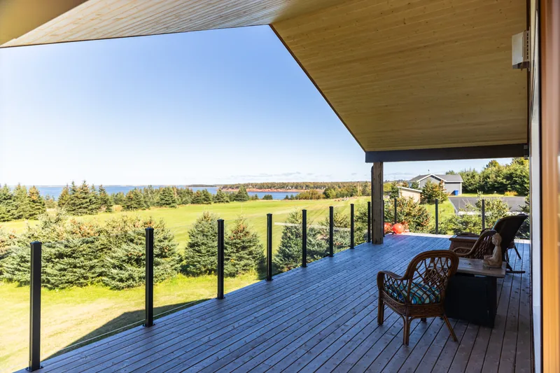 Covered deck overlooking the water