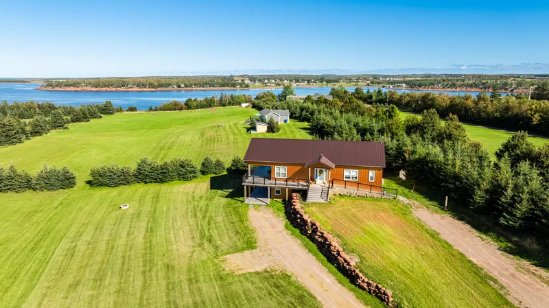 Aerial view of the two-suite house and bay