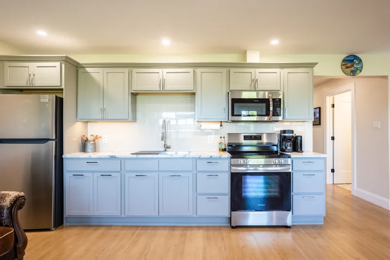 Kitchen with blue cabinets