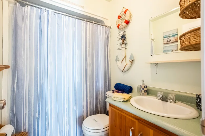 Bathroom with bath and vanity