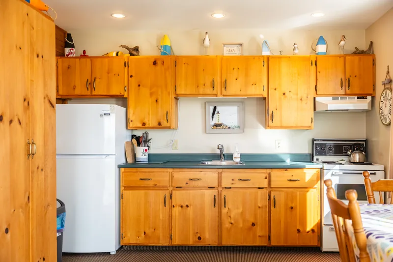 Kitchen with wood cabinets