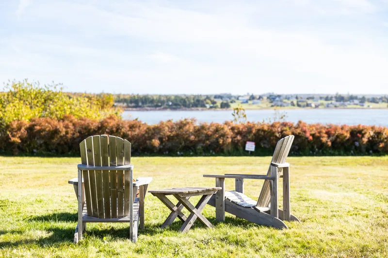 Lawn chairs overlooking the water