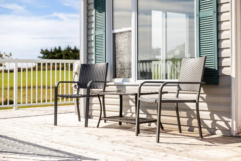 Deck seating beside the patio doors